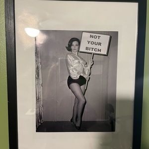 Photo with statement and frame.
